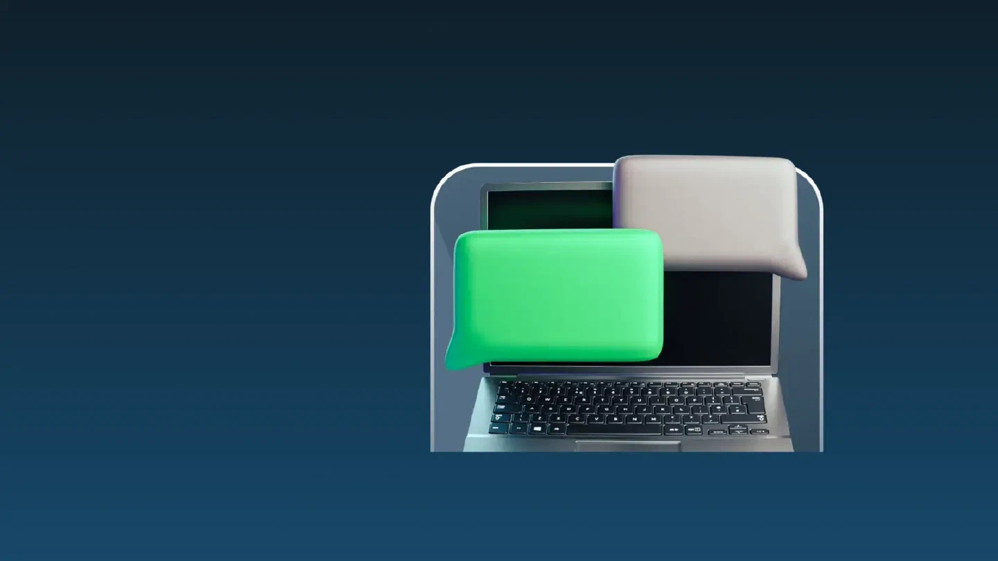 Laptop with green and white support message bubbles